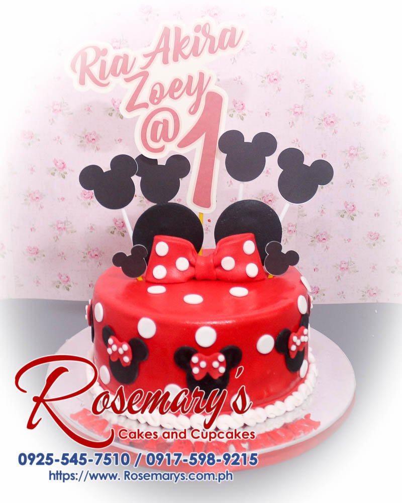 Minnie Mouse Themed Cake for Ria Akira Zoey Delicious Minnie Mouse themed cake by Rosemary's Cakes, featuring a black layer, red ribbon, and whimsical design. Contact: 0925-545-7510.