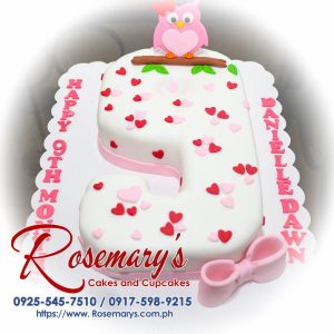 Delicious pink number cake featuring an adorable owl and ribbon, perfect for themed celebrations. From Rosemary's Cakes, call 0925-545-7510.