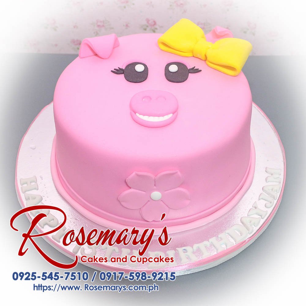Piggy Themed Cake for Jam Delicious pink piggy themed cake with a decorative ribbon, crafted by Rosemary's Cakes. Contact 0925-545-7510.