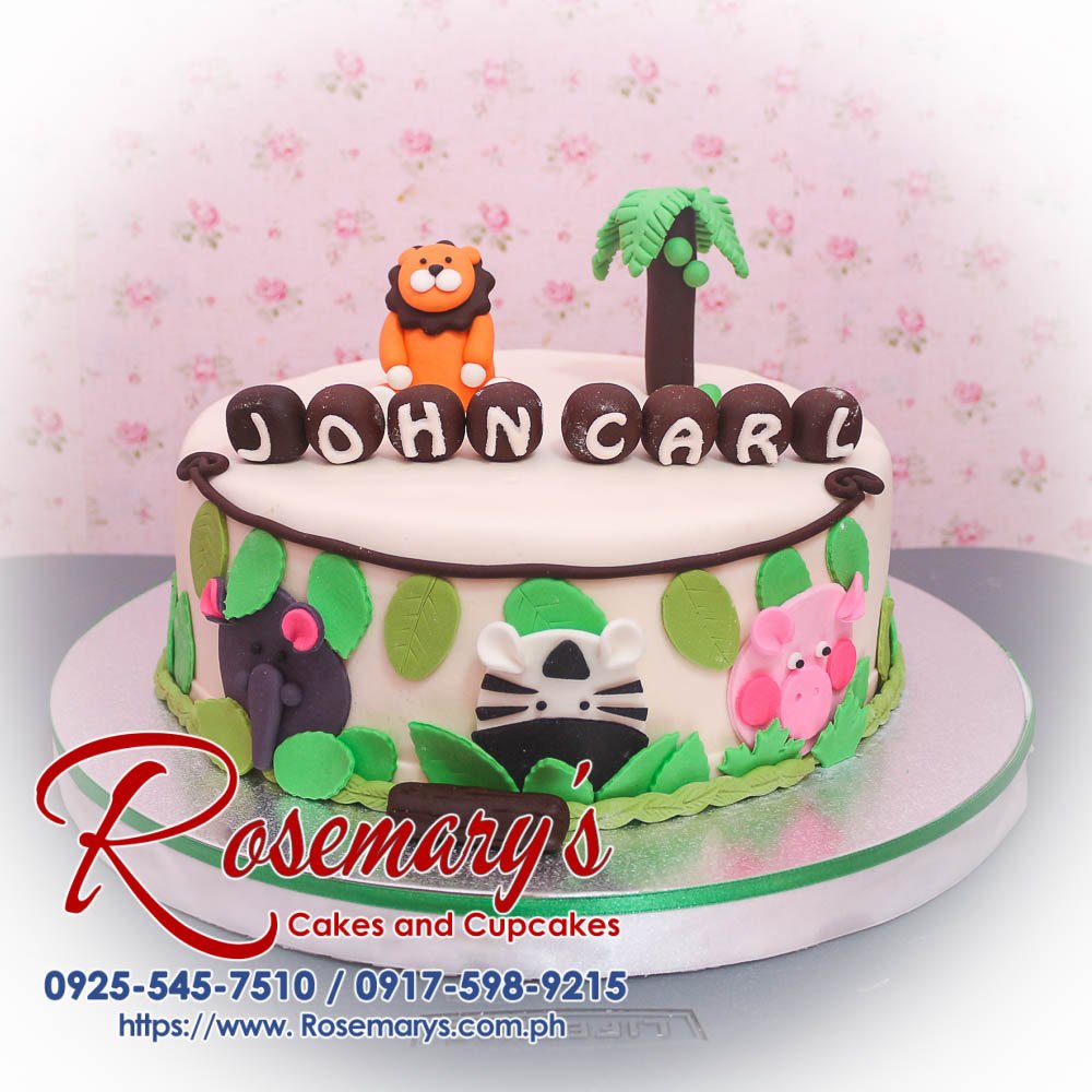 Safari themed 1-layer cake featuring vibrant animal decorations, perfect for any celebration. Order from Rosemary's Cakes at 0917-598-9215.