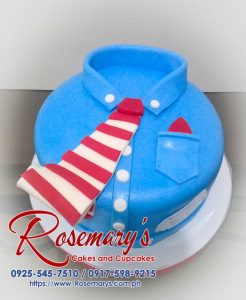 Elegant one-layer blue cake with white stripes resembling a shirt and tie. Perfect for celebrations! Order yours from Rosemary's Cakes: 0925-545-7510