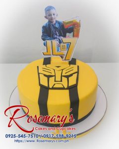 Delicious yellow Transformer-themed cake with intricate frosting details. One-layer delight perfect for any celebration! Order yours from Rosemary's Cakes: 0917-598-9215.