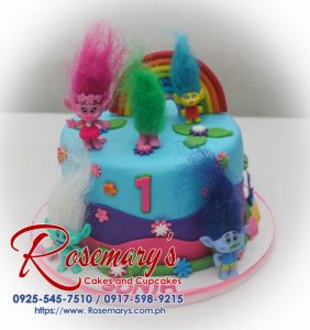 One-layer blue, pink, and purple cake with Troll figurines. Celebrate in style with a custom cake from Rosemary's Cakes! Call 0917-598-9215.
