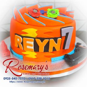 Delicious one-layer Beyblade themed cake in vibrant orange for a birthday celebration. Order from Rosemary's Cakes at 0925-545-7510.