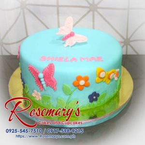 Delicious 1 layer blue butterflies themed cake by Rosemary's Cakes, perfect for any celebration. Contact: 0917-598-9215.