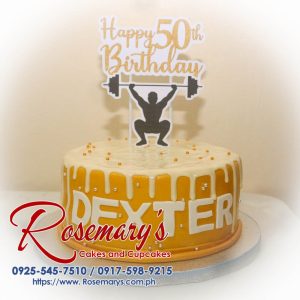 Delicious 1 layer drip cake for a 50th birthday, adorned with gold accents. Order from Rosemary's Cakes: 0917-598-9215.