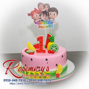 Delicious 1 layer Cocomelon themed cake with pink frosting and fresh fruits, perfect for any celebration. Rosemary's Cakes - 0925-545-7510.