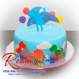 Delicious 1 layer dinosaur themed cake by Rosemary's Cakes, adorned with pastel colors and cute dino toppers. Contact: 0917-598-9215.
