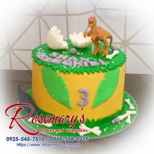 Delicious 1 layer dinosaur themed cake from Rosemary's Cakes, featuring vibrant green decoration. Contact: 0917-598-9215.