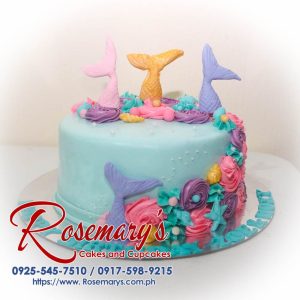 Delicious 1 layer blue mermaid-themed cake adorned with shells, perfect for celebrations. Order from Rosemary's Cakes at 0925-545-7510.