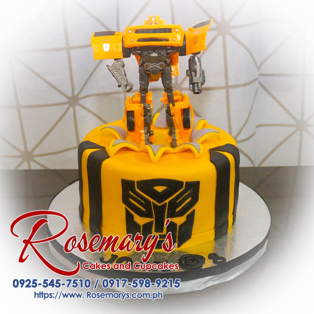 1 Layer Transformers Themed Cake for Joax’s 8th Birthday Delicious 1 layer Transformers themed cake featuring Bumblebee in vibrant yellow. Order from Rosemary's Cakes: 0917-598-9215.