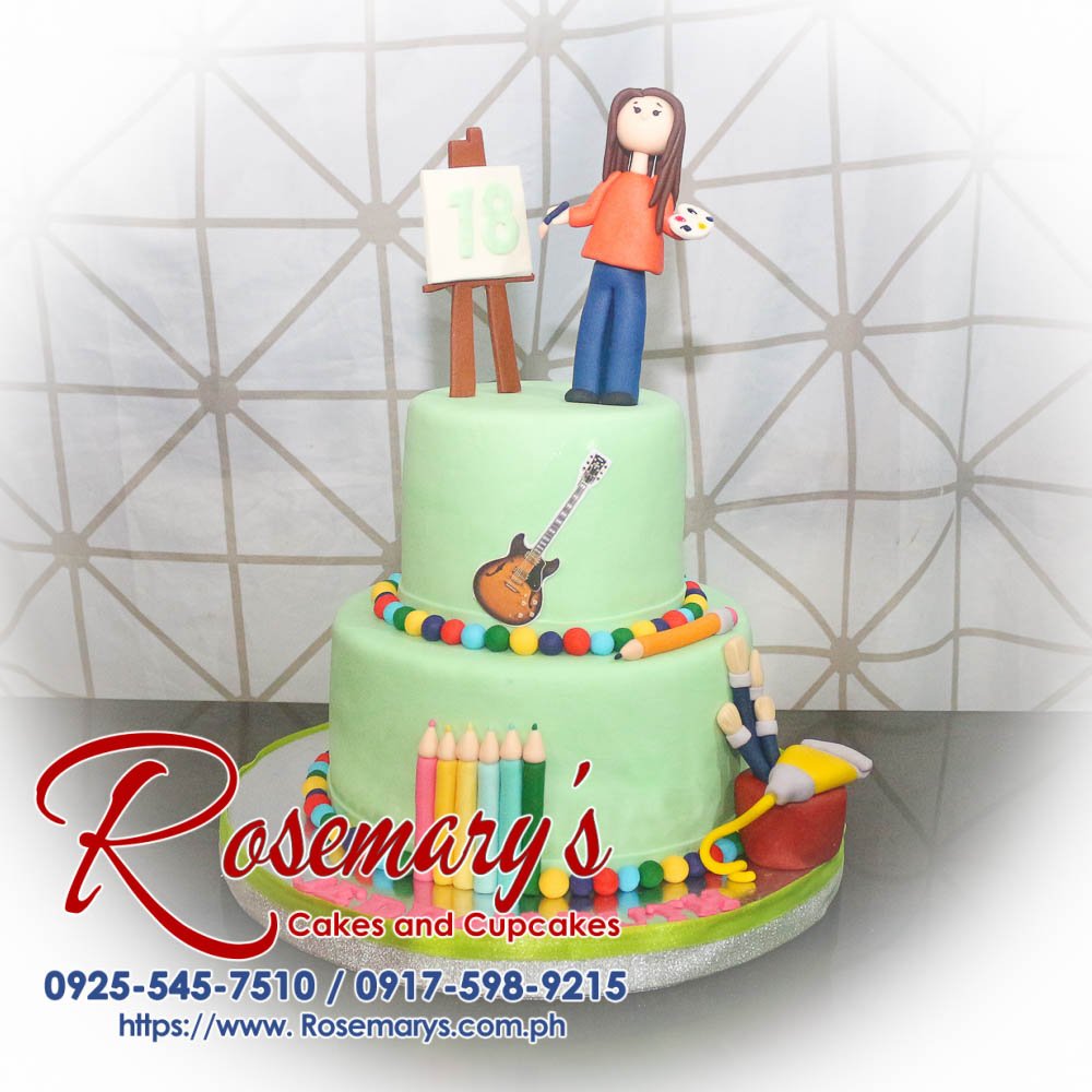 A delicious 2-layer artist-themed cake from Rosemary's Cakes, featuring vibrant greens and colorful art designs. Contact: 0925-545-7510.