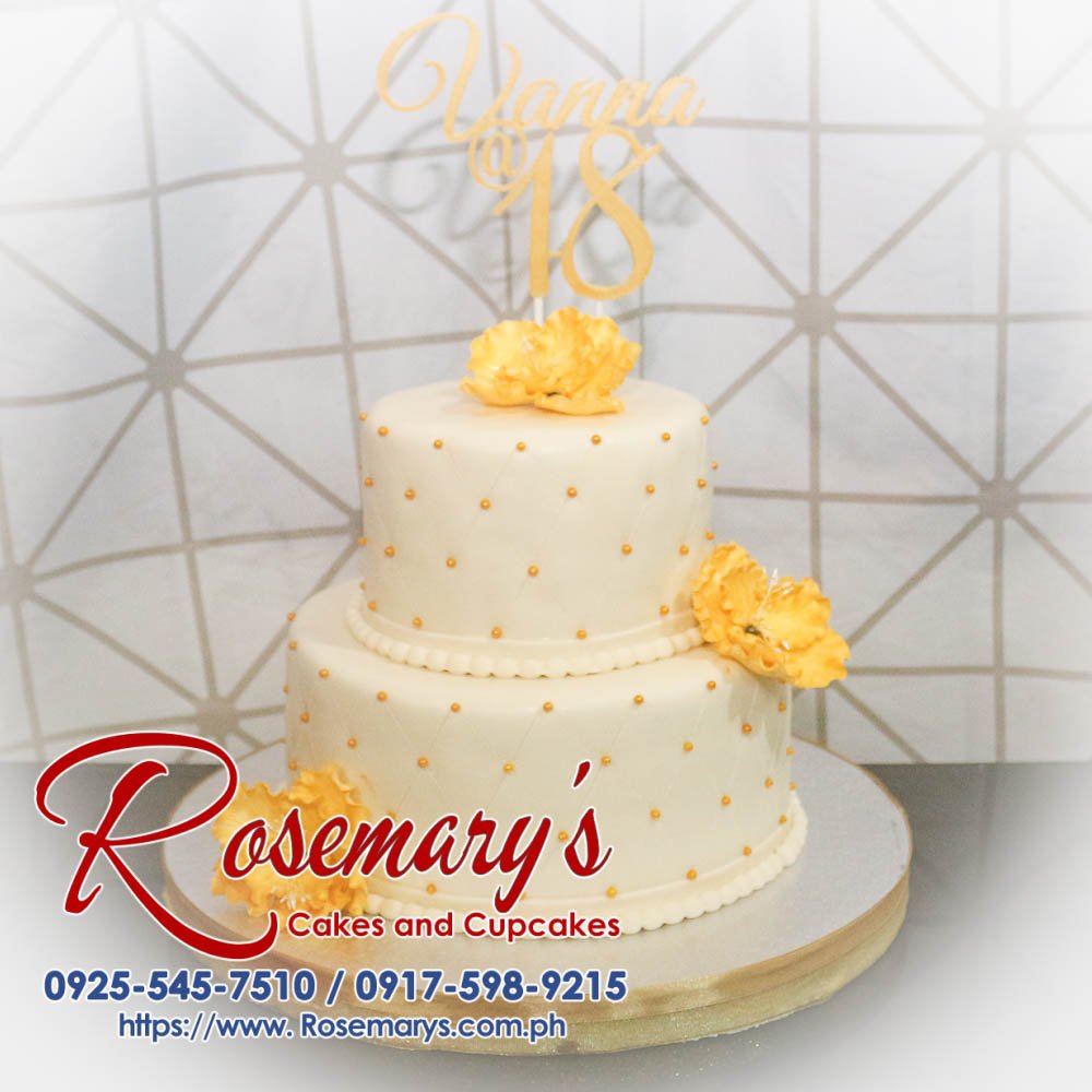 2 Layer Cake for Vanna’s 18th Birthday Elegant 2 layer cake featuring gold accents and 3D printed decor, perfect for any celebration. Rosemary's Cakes, 0917-598-9215.