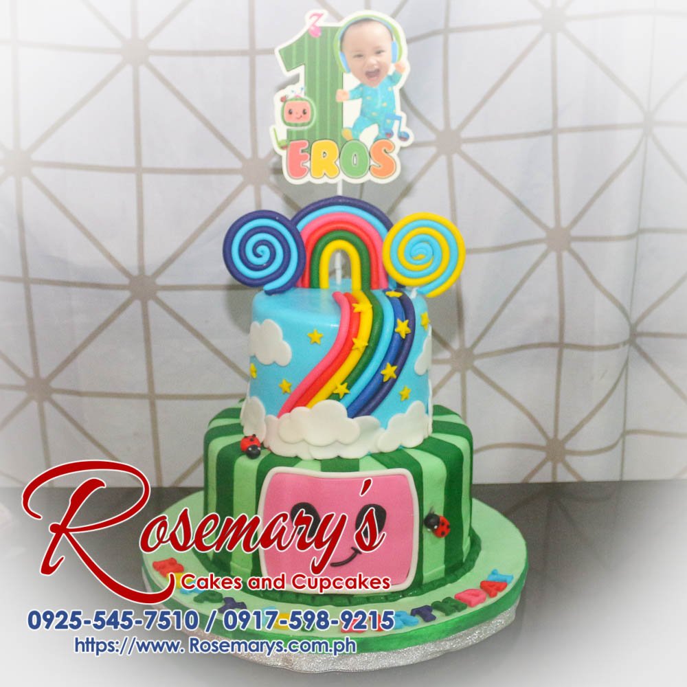 Delicious 2 layer Cocomelon themed cake with vibrant green and rainbow colors. Order from Rosemary's Cakes, 0917-598-9215.