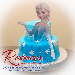 Delicious 2 layer Frozen themed cake with Elsa, icy blue frosting, and intricate details from Rosemary's Cakes. Contact: 0917-598-9215.