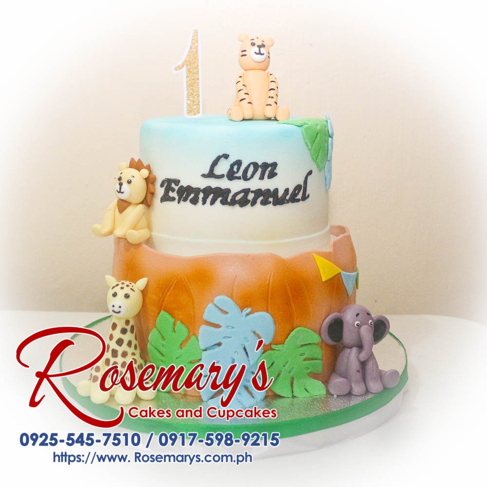 Delicious 2 layer safari themed cake adorned with pastel animals, perfect for any celebration. Visit Rosemary's Cakes, call 0925-545-7510.