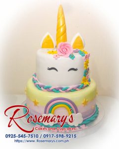 Two-layer unicorn cake in pastel rainbow colors, a delicious themed cake from Rosemary's Cakes. Contact: 0917-598-9215.