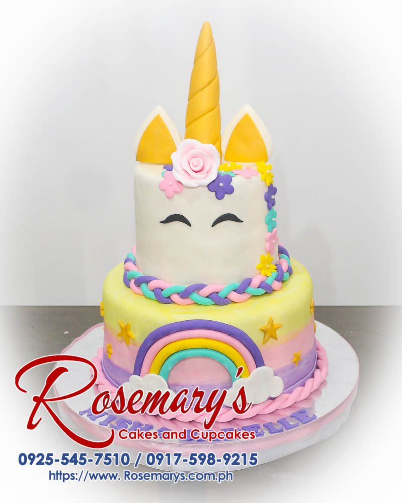 2 Layer Unicorn Themed Cake for Misha Isabelle Delicious 2 layer unicorn themed cake in gold, pink, and rainbow colors from Rosemary's Cakes. Contact: 0925-545-7510.
