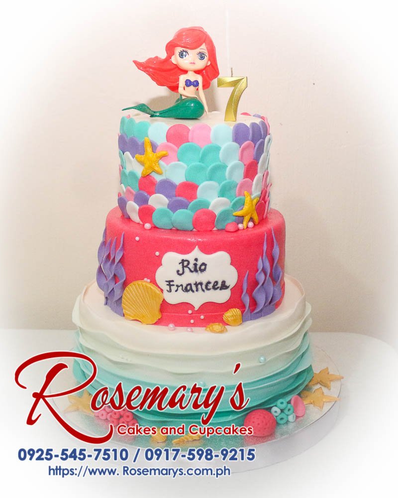 Delicious 3 Layer Ariel themed cake by Rosemary's Cakes, featuring pastel colors and Little Mermaid design. Contact: 0917-598-9215.