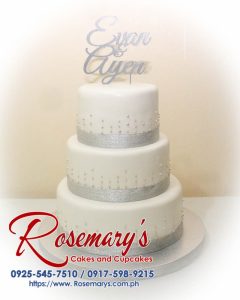 Delicious 3-layer wedding cake with 3D printed silver accents, featuring a white themed design. From Rosemary's Cakes, 0925-545-7510.
