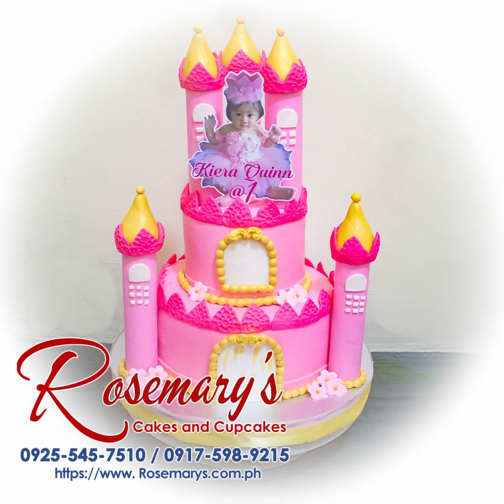 Three-layer gold and pink princess castle themed cake by Rosemary's Cakes, featuring intricate details and delightful flavors. Contact: 0925-545-7510.