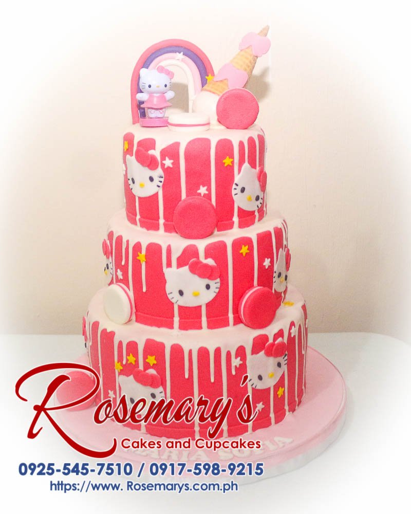 3 Layer Hello Kitty Themed Cake for Maria Sofia Three-layer Hello Kitty themed cake in pink with delightful drips, perfect for celebrations. Order from Rosemary's Cakes, 0925-545-7510.