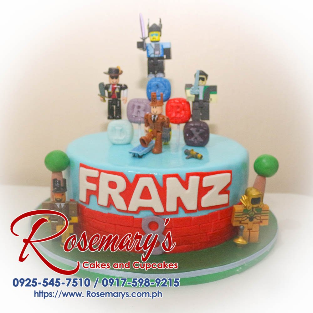 Vibrant blue Roblox themed cake, 1 layer, decorated with fun game icons. Order at Rosemary's Cakes, 0925-545-7510.