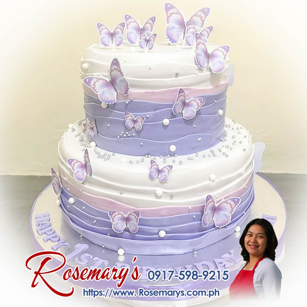 2 layer purple ombre butterflies cake for kaori’s 1st birthday 2 layer purple ombre butterflies cake with delicate butterfly decorations, a delicious themed cake by Rosemary's Cakes. Contact 0917-598-9215.