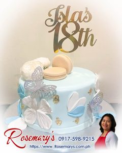 1 layer cake with butterflies and macarons, a delicious themed cake by Rosemary's Cakes. Contact 0917-598-9215 for yummy cakes.