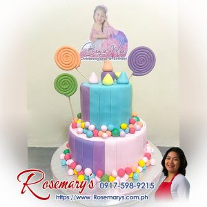 Candyland themed 2 layer cake with colorful candy decorations, a delicious and yummy cake by Rosemary's Cakes. Contact 0917-598-9215.