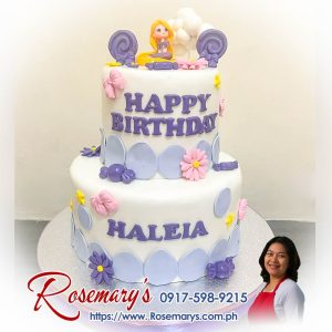 Purple and pink Rapunzel themed 2 layer cake, delicious and yummy, by Rosemary's Cakes. Order now at 0917-598-9215.