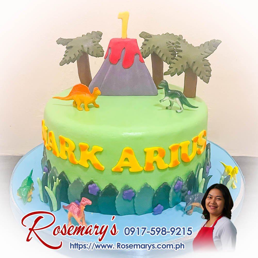 Delicious dinosaur-themed cake with vibrant colors and detailed dinos, perfect for birthdays. Rosemary's Cakes 0917-598-9215.