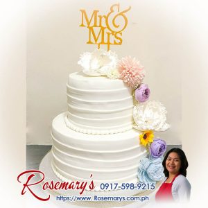 Elegant 2 layer Mr and Mrs wedding cake by Rosemary's Cakes, delicious and beautifully themed. Order now: 0917-598-9215.